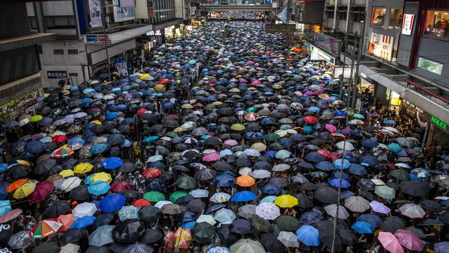 Up to 1.7 million people march through Hong Kong in heavy rain on Sunday. Picture: Getty Images