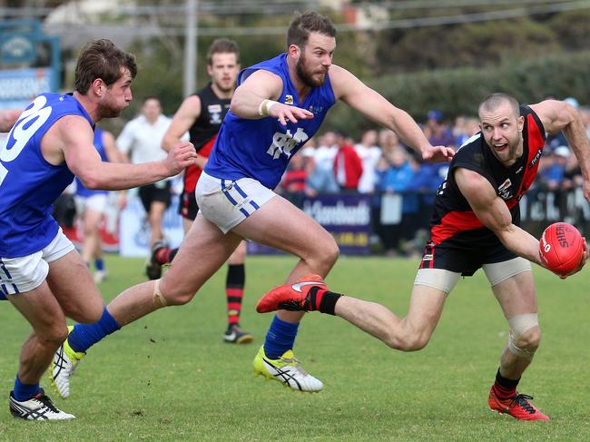 Beau Muston of Frankston handballs during the Nepean FL Grand Final between the Frankston Bombers and Hastings played in Frankston on Saturday 10th September, 2016. Picture: Mark Dadswell