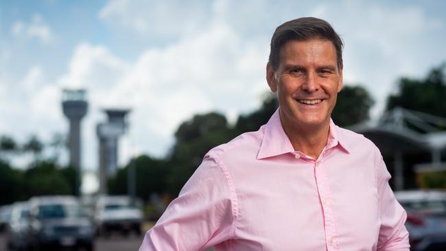 NT Airport Property and Terminal executive general manager Ross Baynes stands in front of Darwin International Airport where a series of solar arrays are beginning to be installed. Photograph: Che Chorley