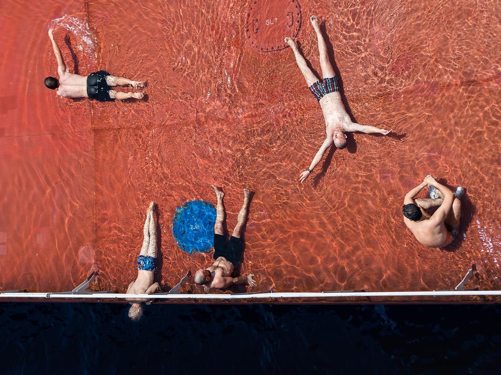 Happiness is in The Small Things. Photographer: Cezar Gabriel Popescu Year: 2018 “Life on board of an oil tanker can be difficult. Long crossings, months away from family and friends, hard work. Sometimes, it’s good to just let go, relax and enjoy the moment. It’s surprising how little it takes for grown men to revert to childhood: One foot of water and a clear sunny mid-Atlantic day. The photo shows a group of shipmates enjoying such a moment.” Copyright: © Cezar Gabriel Popescu, Romania, Entry, Open, Travel, 2018 Sony World Photography Awards