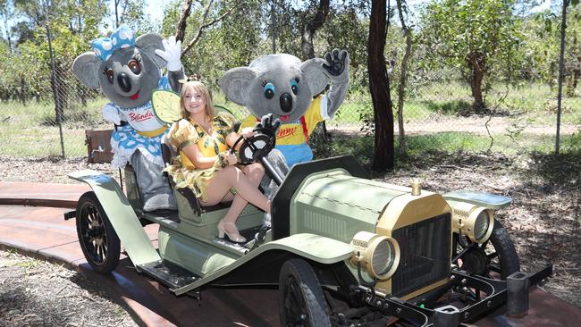 Cooee the Gumnut Fairy drives Kenny and Belinda Koala in the old Model T cars at Dreamworld. Picture: Glenn Hampson