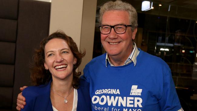 Liberal candidate Georgina Downer with her father Alexander Downer at the Barker Hotel after making her concession speech. Picture: AAP / Kelly Barnes