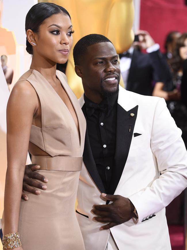 Kevin Hart and Eniko Parrish attends the Oscars 2015 red carpet. Picture: Getty