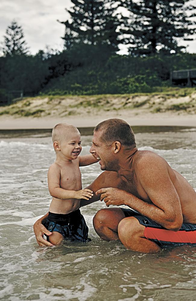 Mick Fanning and son Xander in Fingal Head. Photo: Jamie Green.