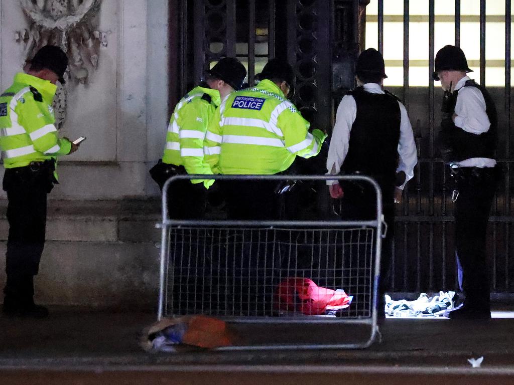 Police at the scene outside Buckingham Palace after a man was arrested and a subsequent controlled explosion was carried out. Picture: Getty Images