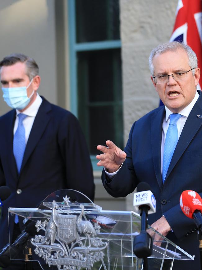 Treasurer Dominic Perrottet and Prime Minister Scott Morrison announce the package on Tuesday. Picture: NCA NewsWire / Christian Gilles