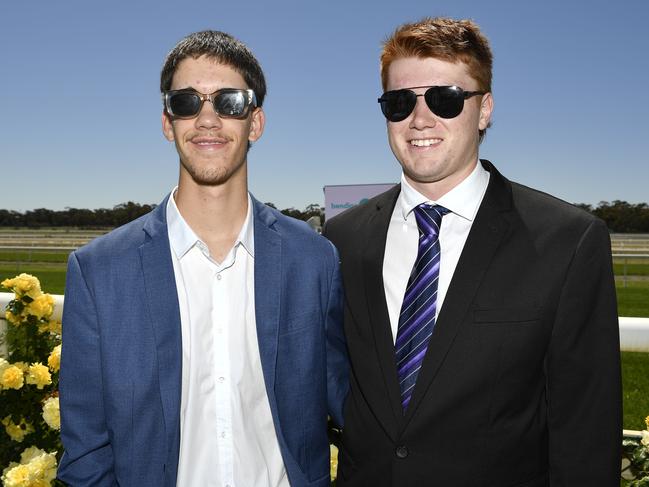 Apiam Bendigo Cup was held at Bendigo Racecourse, Bendigo, Victoria, on Wednesday, October 30th, 2024. Pictured enjoying the horse racing carnival are Tate and Malik. Picture: Andrew Batsch