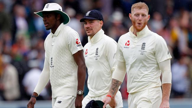 England's Jofra Archer, Rory Burns and Ben Stokes. Picture: AFP