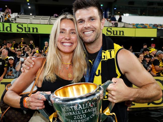 Trent Cotchin shares the 2020 premiership cup with wife Brooke.