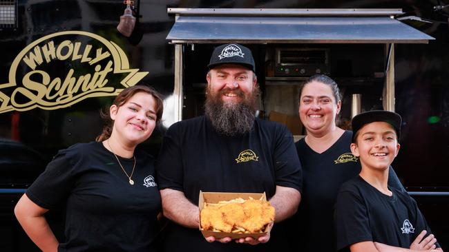 John O'Kane with his family Valerie, 12, Candice, and Hugh, 11, from Wholly Schnit food truck, in Waterloo. Picture: Justin Lloyd.