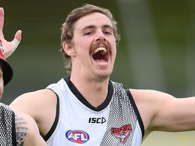 MELBOURNE, AUSTRALIA - FEBRUARY 19: Jake Stringer and Joe Daniher of the Bombers have a laugh during an Essendon Bombers AFL training session at The Hangar on February 19, 2019 in Melbourne, Australia. (Photo by Quinn Rooney/Getty Images)