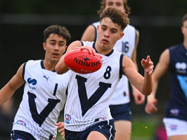 MELBOURNE, AUSTRALIA - June 8: Cody Walker of Vic Country kicks the ball during the AFL 2024 Under 16 Boys Championships match between Vic Metro and Vic Country at Trevor Barker Beach Oval on June 08, 2024 in Melbourne, Australia. (Photo by Morgan Hancock/AFL Photos)