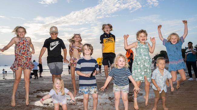 Kids jump for joy at the Territory Day celebrations at Mindil Beach, Darwin. Picture: Pema Tamang Pakhrin