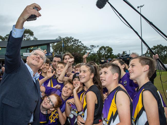 Prime Minister Scott Morrison visits Norwood Sporting Club in Ringwood, Victoria. to meet some of the junior players and join in some AFL footy drills. Picture: Jason Edwards