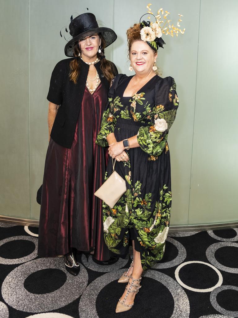 Gabby Schnitzerling (left) and Protea Place CEO Amanda Dalton at the Melbourne Cup luncheon hosted by Rotary Club of Toowoomba City raising funds for Protea Place, Tuesday, November 1, 2022. Picture: Kevin Farmer