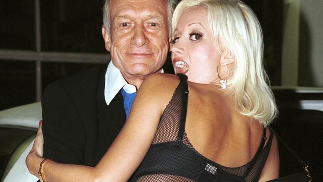 Happier times? Hugh Hefner and girlfriend Holly Madison in 2003. Picture: David Klein