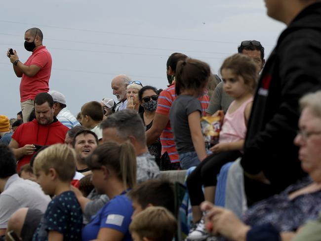 Space fans ditched social distancing to watch the failed launch. Picture: AP