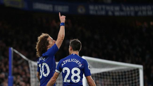 David Luiz celebrates after scoring.