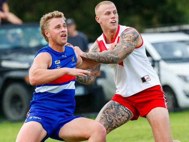 Karingal key forward Riley D'Arcy (right) ignited the Bulls with three goals in the last term. Picture: Alan Dillon