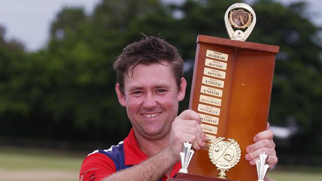 Mulgrave captain Justin Reid with the winner's trophy after claiming victory in the Cricket Far North Grand Final match held at Griffiths Park. Picture: Brendan Radke