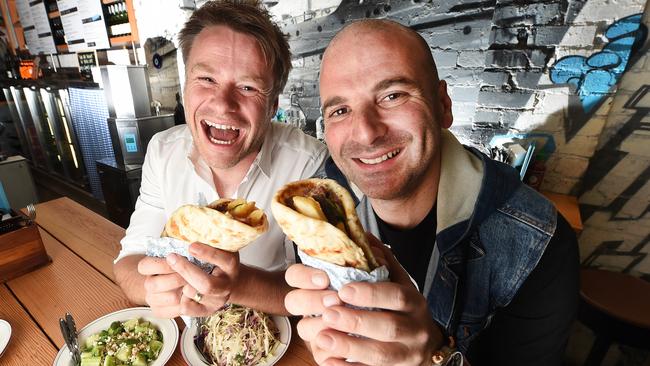 Radek Sali and Calombaris with some tasty dishes from Jimmy Grants. Picture: Rob Leeson