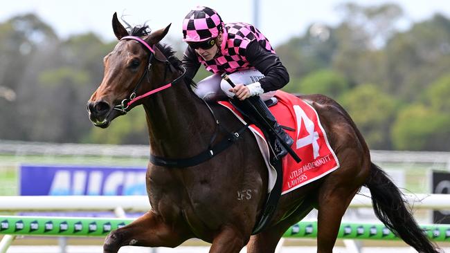 Cosmo Centaurus dashes away to win the $100,000 Inglis bonus for Rob Heathcote and jockey Bailey Wheeler at the Sunshine Coast. Picture: Grant Peters/Trackside Photography