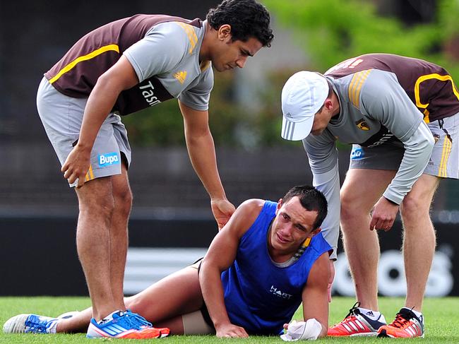 Woodward suffers his second ACL injury, at Hawthorn training in 2013.