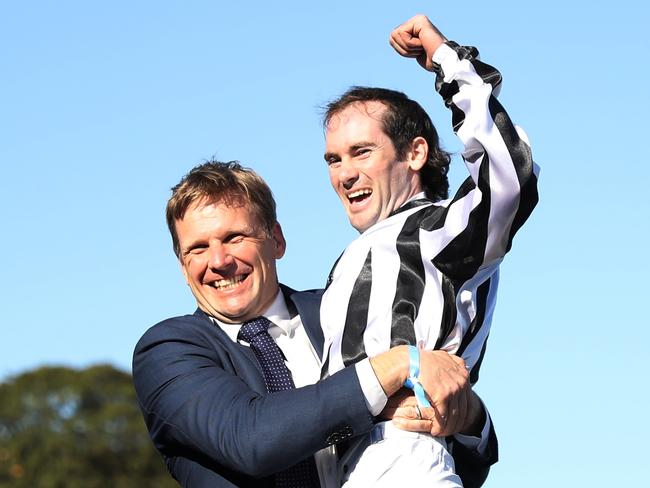 SYDNEY, AUSTRALIA - OCTOBER 26: Trainer Bjorn Baker celebrates after Tyler Schiller riding Belclare wins Race 8 The Invitation during "Spring Champion Stakes Day" Sydney Racing at Royal Randwick Racecourse on October 26, 2024 in Sydney, Australia. (Photo by Jeremy Ng/Getty Images)