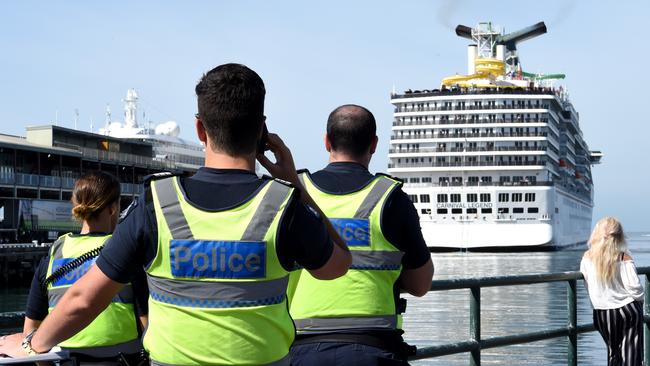 Police waiting at the dock in Port Melbourne. Picture: Nicole Garmston