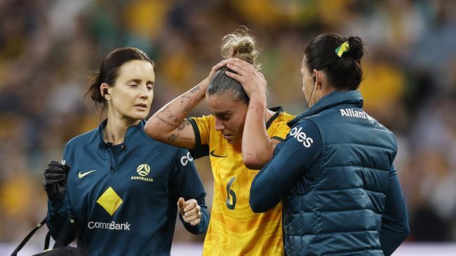 MELBOURNE, AUSTRALIA - DECEMBER 04: Chloe Logarzo of Australia reacts after a head clash with Chan Pi-Han of Chinese Taipei during the International Friendly match between Australia Matildas and Chinese Taipei at AAMI Park on December 04, 2024 in Melbourne, Australia. (Photo by Daniel Pockett/Getty Images)