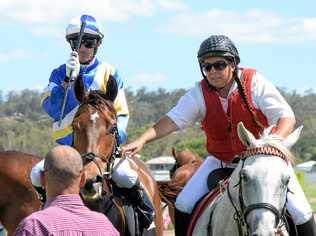 Jockey Justin Stanley guides Watchmen back to the Ipswich Turf Club enclosure after his win at Ipswich racetrack. Picture: Rob Williams