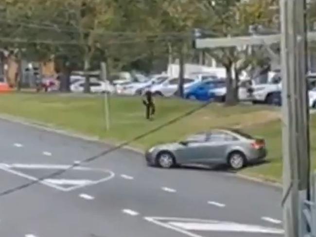 Dash for freedom! A motorist bypasses Queensland's border checkpoints to cross from Thomson St, Tweed Heads, onto Dixon St, Coolangatta, where police nowhere to be seen. Picture: Channel 9