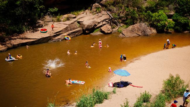 People cooling off at the Jellybean Pool in the Blue Mountains National Park at Glenbrook. Picture: Jonathan Ng