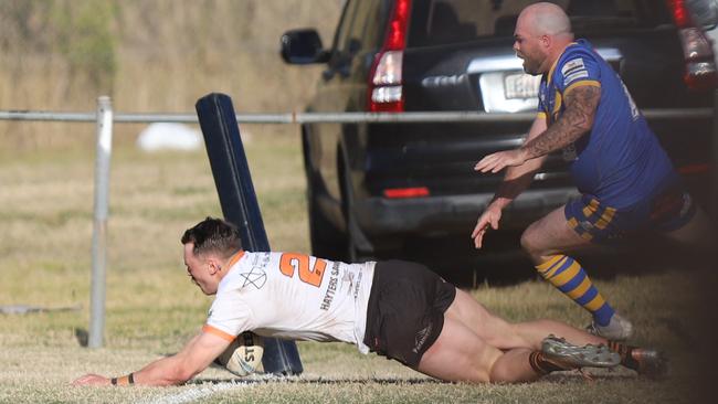 Bailey King runs 80m to score out wide for The Oaks Tigers. Picture: Steve Montgomery