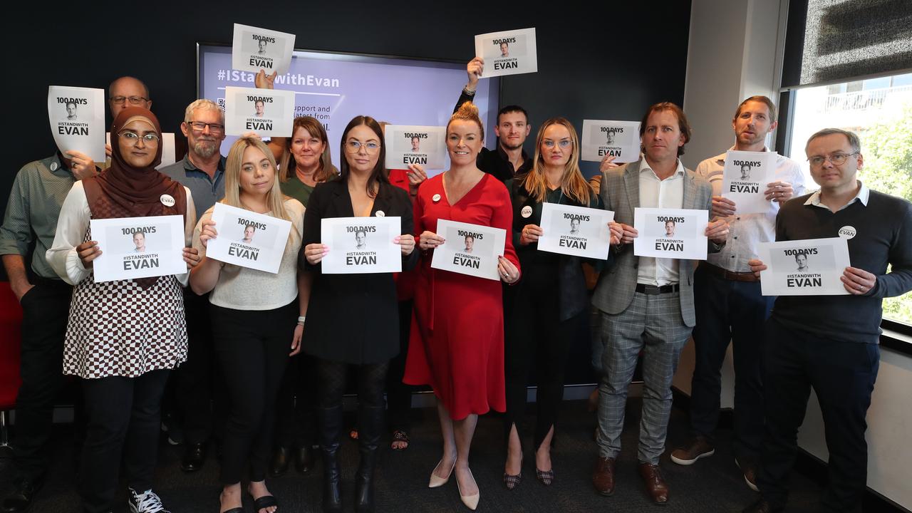 Gold Coast Bulletin staff stand with Evan. Picture: Glenn Hampson