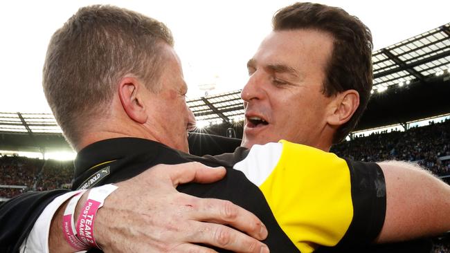 Richmond coach Damien Hardwick and CEO Brendon Gale embrace after the Grand Final. Picture: AFL Media