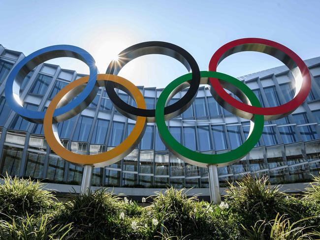 (FILES) In this file photo taken on March 24, 2020 Olympic Rings are seen a the headquarters of the International Olympic Committee (IOC) in Lausanne amid the spread of the COVID-19. - The IOC Executive Board will hold a videoconference on May 14, 2020 to discuss the consequences of the coronavirus pandemic that led to the one-year postponement of the Tokyo Olympic Games, and is also expected to approve a session by video link in July. (Photo by Fabrice COFFRINI / AFP)