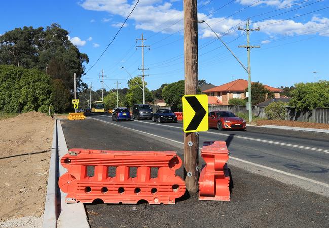 The power poles on Samantha Riley Drive, Kellyville are finally scheduled to be removed. Picture: Toby Zerna