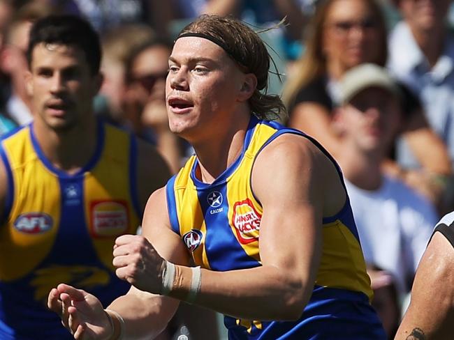 ADELAIDE, AUSTRALIA - MARCH 17: Harley Reid of the Eagles is tackled by Charlie Dixon of the Power during the 2024 AFL Round 01 match between the Port Adelaide Power and the West Coast Eagles at Adelaide Oval on March 17, 2024 in Adelaide, Australia. (Photo by James Elsby/AFL Photos via Getty Images)