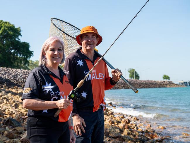 Deputy Opposition Leader Gerard Maley and Robyn Cahill wets a line as the CLP announces it will trial a fish stocking program for barramundi to be released in Darwin Harbour if elected. Picture: Pema Tamang Pakhrin