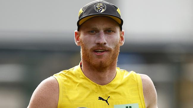 MELBOURNE, AUSTRALIA - MARCH 24: Nick Vlastuin of the Tigers runs laps during a Richmond Tigers AFL training session at Punt Road Oval on March 24, 2022 in Melbourne, Australia. (Photo by Daniel Pockett/Getty Images)