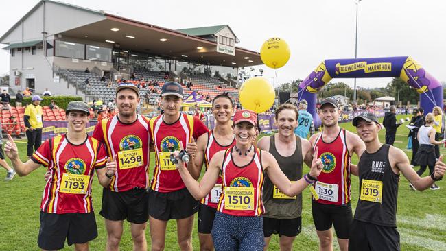 Melanie Magarey, the first female to finish the half marathon of the Toowoomba Marathon event, celebrates with other runners, Sunday, May 5, 2024. Picture: Kevin Farmer