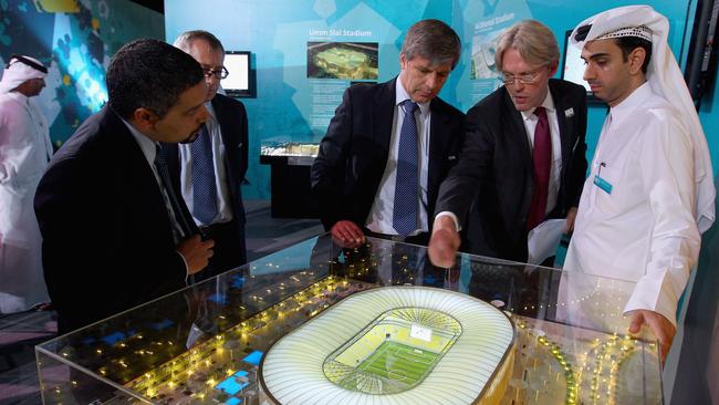 Qatar World Cup officials show FIFA members deisgns for one of their stadiums in 2010 during the bidding process for the 2022 tournament