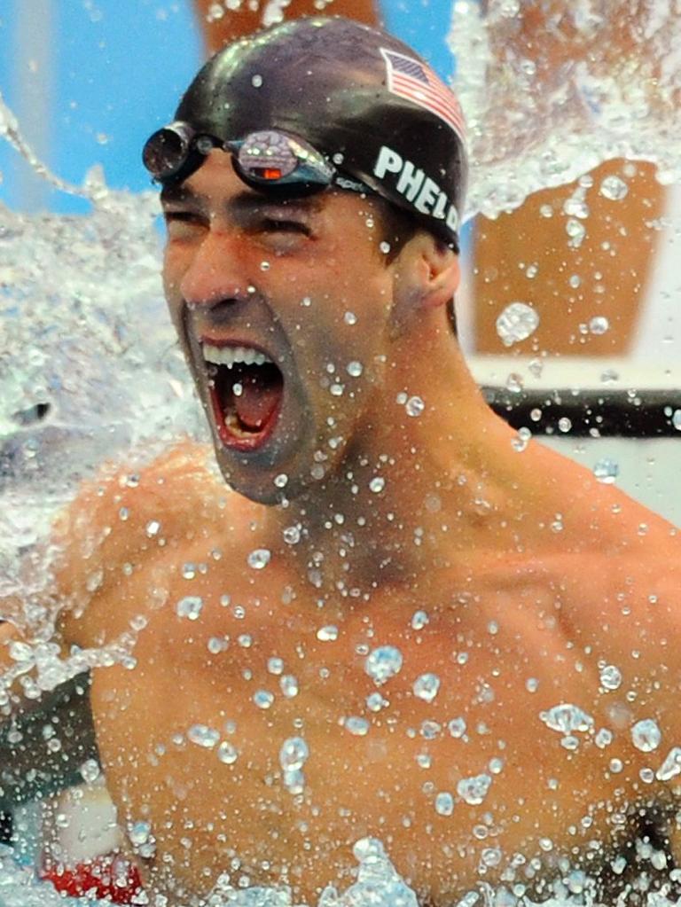 Michael Phelps looked like he was ready to swim again. (Photo by Martin BUREAU / AFP)