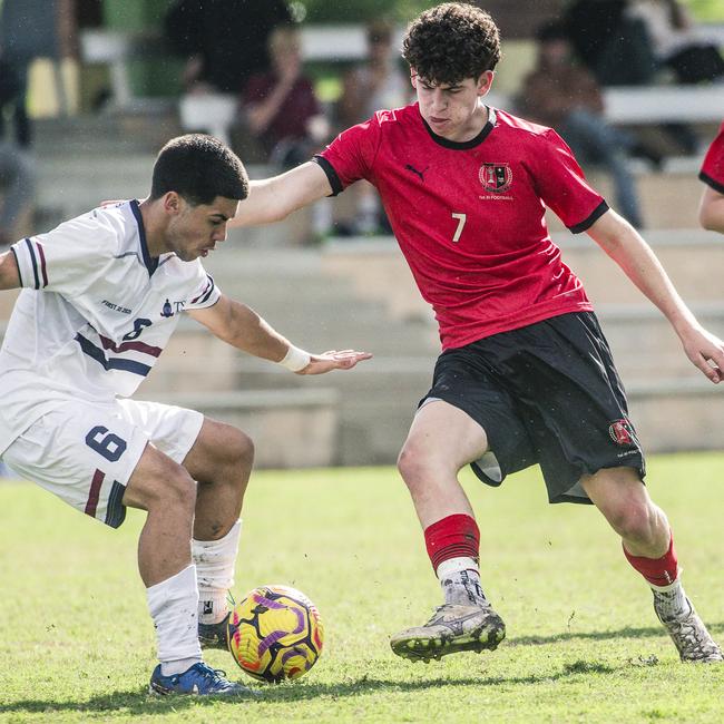 Callum Harris (right) defends a TSS player in round 3. Picture: Glenn Campbell