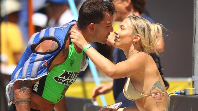 Matt Poole and girlfriend Tammy Hembrow are seen together during the Nutri-Grain Ironman series at Kingscliff in February. (Photo by Chris Hyde/Getty Images)