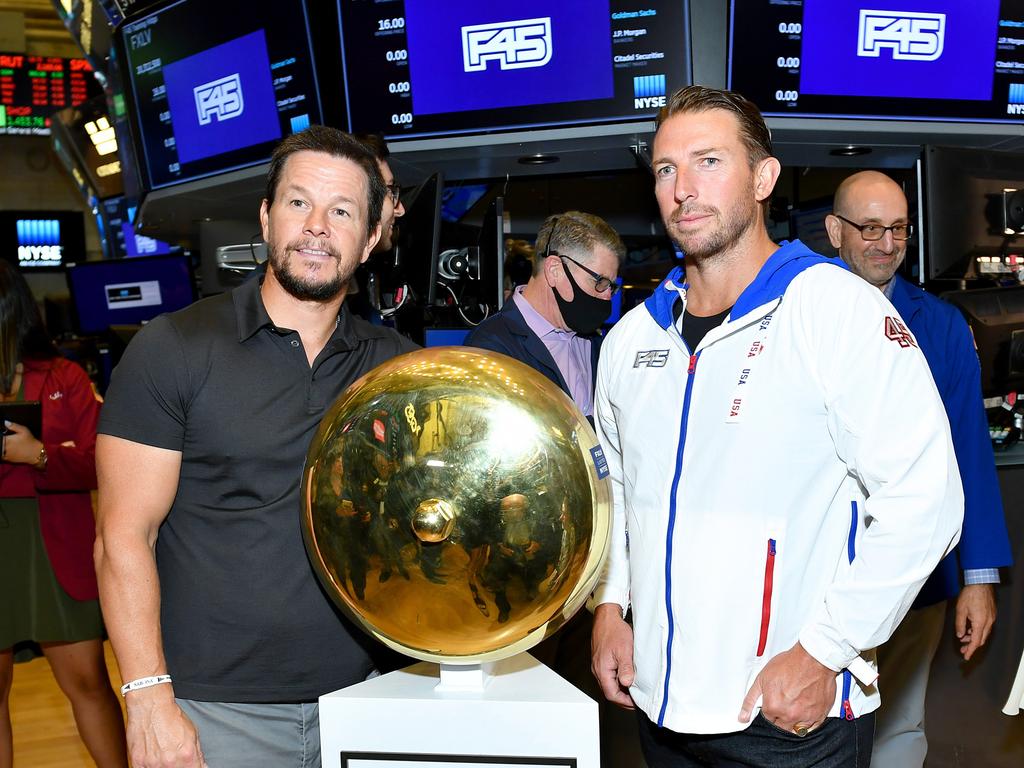 Mark Wahlberg (left) and F45 founder and chief executive Adam Gilchrist at the New York Stock Exchange. Picture: Noam Galai/Getty Images for F45 Training