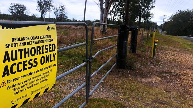 A sign on the Heinemann Rd fence last week, claimed that preliminary works had started. Picture: Judith Kerr