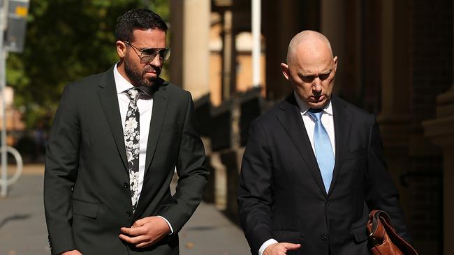 Alleged Forum Finance fraudster Vincenzo Tesoriero, left, pictured last year outside court with his lawyer. Picture: Jane Dempster