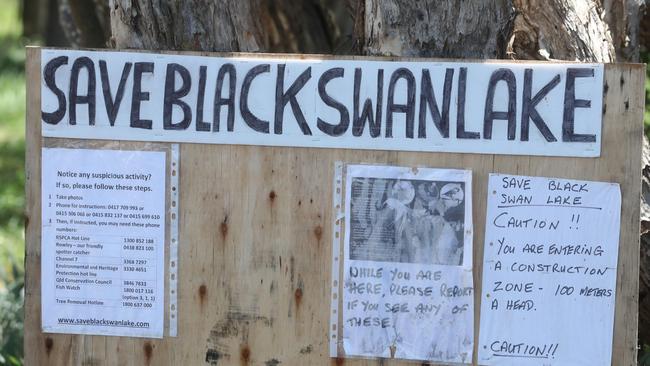 Residents have left signage calling for the lake to be saved. Photo by Richard Gosling